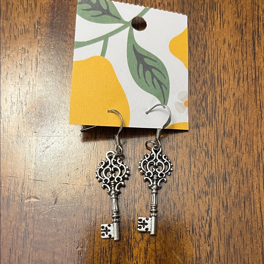 NWT Silver key earrings